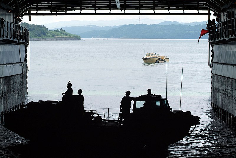 File:US Navy 050706-N-4772B-109 A pair of Light Amphibious Resupply Cargo (LARC) 5-ton vehicles, manned by members of Beachmaster Unit One, negotiate the well deck of USS Harpers Ferry (LSD 49).jpg