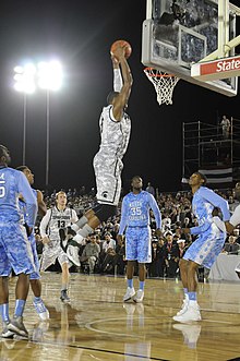 US Navy 111111-N-OK922-242 Michigan State University center Adreian Payne scores against the University of North Carolina during the Quicken Loans.jpg