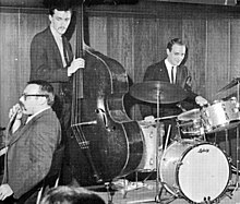 Guaraldi (left), Fred Marshall and Jerry Granelli performing as the Vince Guaraldi Trio in 1963.