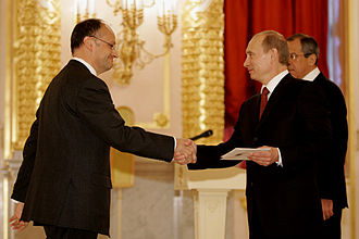 Stronck presenting his credentials to Vladimir Putin in December 2007. Vladimir Putin with Gaston Stronck.jpg