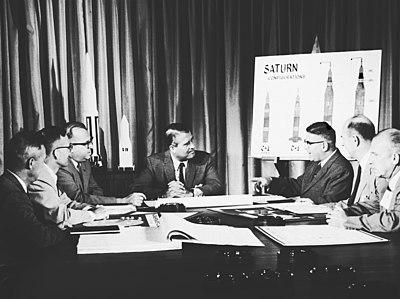 Wernher von Braun in 1961 with members of his management team. Pictured from left to right are, Werner Kuers, Director of the Manufacturing Engineering Division; Dr. Walter Haussermann, Director of the Astrionics Division; Dr. William Mrazek, Propulsion and Vehicle Engineering Division; Dr. von Braun; Dieter Grau, Director of the Quality Assurance Division; Dr. Oswald Lange, Director of the Saturn Systems Office; and Erich W. Neubert, Associate Deputy Director for Research and Development. VonBraunTeam1961.jpg