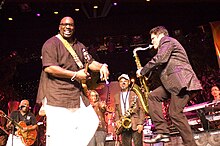 Dave and Wayman Tisdale performing at the Dave Koz & Friends Smooth Jazz Cruise 2006 Wayman Tisdale & Dave Koz.jpg