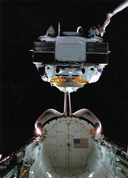 Compton Gamma Ray Observatory being deployed from Space Shuttle Atlantis in 1991 in Earth orbit