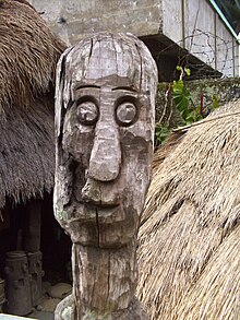 A fertility god of the Bontoc people in an ato (communal meeting circle) A fertility god of the Bontoc Tribe in an Ato.jpg
