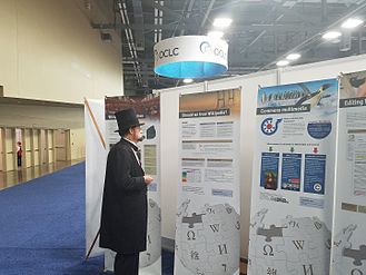 At the IFLA World Library and Information Congress 2016, Abe Lincoln re-enactor looking at Wikipedia Space exhibit, August 16