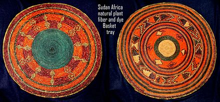 Sudanese basket-tray, tabar of weaved natural plant fibre, coloured in different colours