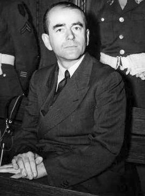 Monochrome photograph of the upper body of Albert Speer, signed at the bottom