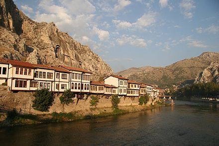 Traditional riverside houses of Amasya, backed by ancient rock tombs