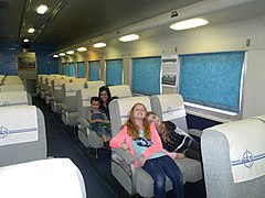 Visitors pose inside the Santa Fe "Diablo Canyon" Coach Car]] #3079.