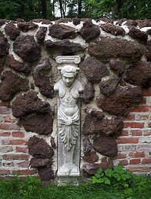 Part of Wall with Herma--usage of bog ore in architecture Arkadia wall with hermes01.jpg