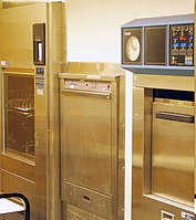 The machine on the right is an autoclave used for processing substantial quantities of laboratory equipment prior to reuse, and infectious material prior to disposal. (The machines on the left and in the middle are washing machines.)