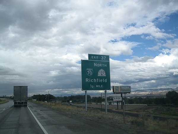 A sign for Exit 37 and Business Loop 70 and SR-120, August 2013