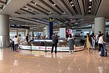 Terminal 3 baggage claim hall Baggage carousel 31 at ZBAA T3 (20190717163111).jpg
