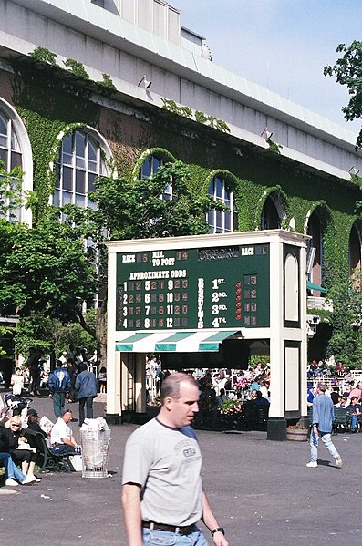 Arched windows of the Belmont grandstand and tote board in 1999 photo