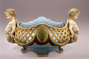 Vase in coloured lead-glazed Victorian majolica, designed by Carrier-Belleuse, 1868. Boat-shaped ornamental vase MET ES3242.jpg