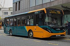 An Alexander Dennis Enviro200 in green and orange livery used from 2007 until 2021