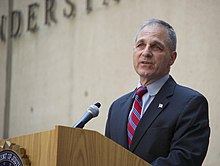 Penn State formerly contracted Louis Freeh, former Director of the Federal Bureau of Investigation (FBI), in an attempt to alleviate responsibility in the Sandusky scandal. In the Piazza case, the FBI investigated Penn State students. Director Freeh at Mueller Farewell.jpg