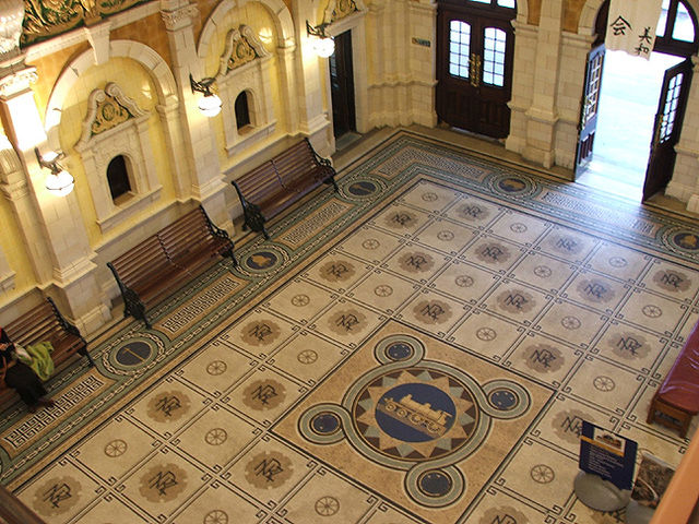 Interior of the station, showing the booking hall's mosaic floor