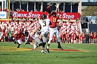 Iowa State's Will McDonald IV (9) jumps to deflect a pass attempt by Oklahoma State's Spencer Sanders (3).