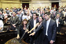 Moyano (to the right) being sworn in as deputy for his first term, in 2011. Facundo Moyano jura como diputado.JPG