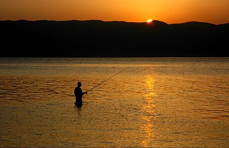 Fishing in Lake Ohrid at sunset