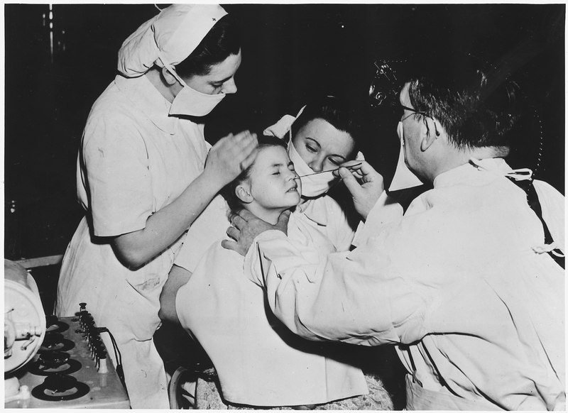 File:France. Radium is being used by doctors to cure a nasal infection of this little girl in a French hospital. This and... - NARA - 541688.tif