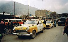 GAZ-21 and Toyota Corolla E70 taxis in Kabul, Afghanistan in 2002 GAZ-21 "Volga", used as a taxi on the Kabul streets.jpg
