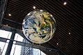 Photorealistic globe suspended from the ceiling at the Vancouver Convention Centre West Building