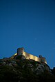 Harlech Castle - view of floodlit castle from NW.jpg