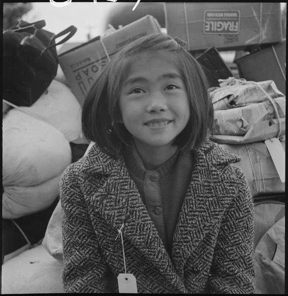 File:Hayward, California. A young member of an evacuee family awaiting evacuation bus. Evacuees of Japa . . . - NARA - 537510.tif