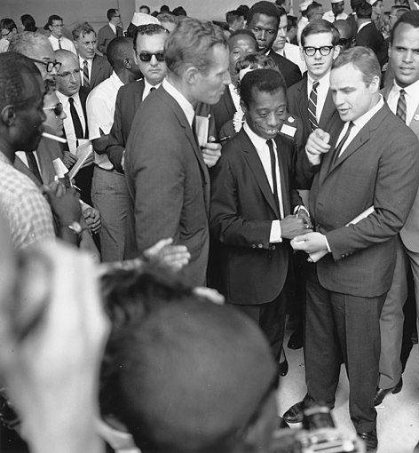 Charlton Heston, James Baldwin, Marlon Brando, and Harry Belafonte