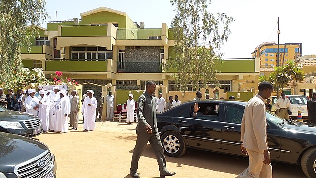 Chadian president Idriss Déby leaving the late Turabi's private estate after attending mourning ceremonies