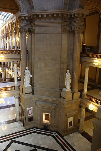 Two of the eight sculptures depicting the Values of Civilization IndianaStateHouseRotundaSculpture.jpg