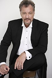 John de Lancie made his seventh appearance as Q during the series in "Tapestry". John de Lancie opera.jpg