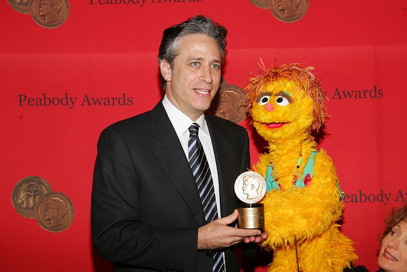 File:Jon Stewart and Kami (The HIV Positive Muppet) (8226391485).jpg