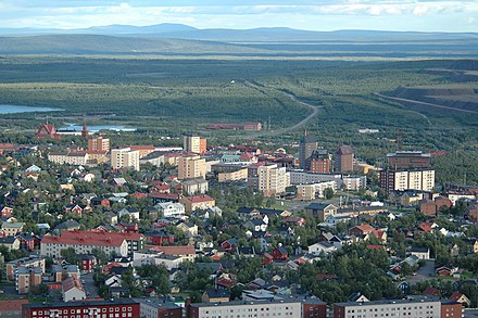 View over Kiruna, with forest in the background and fells at the horizon