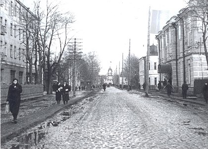 Вид на Заводоуправление в створе проспекта Ленина. Слева новый дом для рабочих Ижорского завода. Фото 1937 года