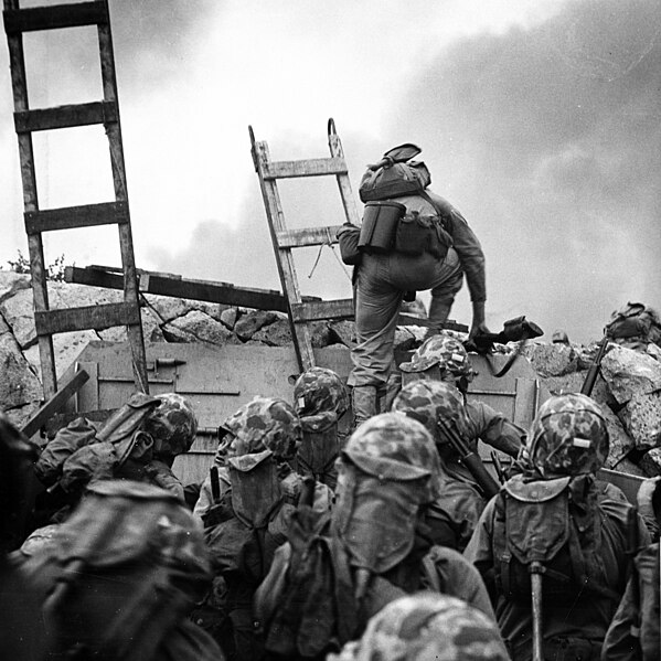 File:Lopez scaling seawall (cropped, 1to1 portrait).jpg