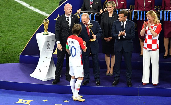 Luka Modrić receives the golden ball prize at the hands of Russian President Vladimir Putin.jpg
