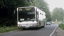 Bus der Linie 015 auf der Donker Straße, aus Neersbroich kommend