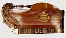 An Alpine Zither. Note the harp post at the top of the image.