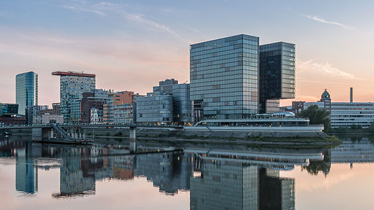 The tower buildings at the Hafenspitze in Düsseldorf at sunset