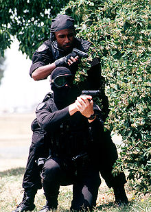 USAF Security Forces SWAT officers during a training exercise at Travis Air Force Base in 1995 Members of the 60th Security Police Squadron's Base Swat Team.jpg