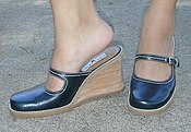 Woman's Maryjane style mules with a wedge heel