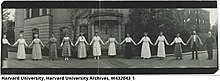 This photo was taken in 1918. It is a picture called "paper doll" in which Harvard Computers are shown holding hands. Left to right: Ida E. Woods, Evelyn Leland, Florence Cushman, Grace Brooks, Mary Vann, Henrietta Swan Leavitt, Mollie O'Reilly, Mabel Gill, Alta Carpenter, Annie Jump Cannon, Dorothy Block, Arville Walker, Frank E. Hinckley (telescope operator), Edward King (chief of stellar photography). Observatory Staff in "paper doll" pose, (in line holding hands) panoramic photograph ca. 1918.jpg