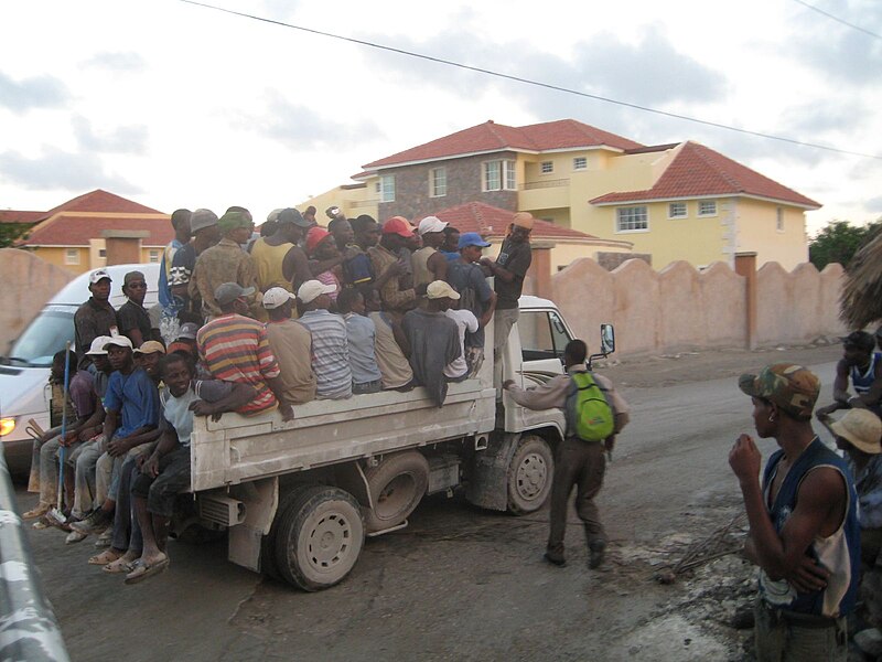 File:One Too Many; 50+ Haitian Workers In Transit.jpg