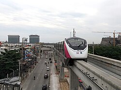 MRT Pink Line skytrain runs above Chaeng Watthana Road in the Lak Si area