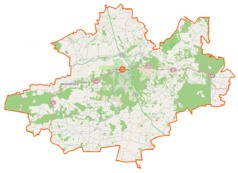 Mapa konturowa powiatu białobrzeskiego, blisko centrum u góry znajduje się punkt z opisem „Białobrzegi”