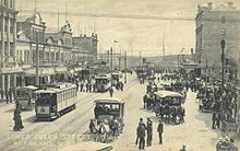 Lower Queen Street in 1919, with trams, cars and horse-drawn cabs visible. Queen Street Lower Auckland.jpg