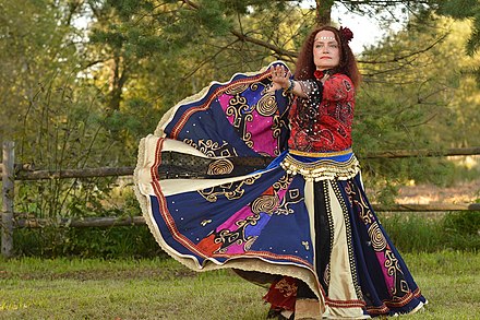 A dancer from Maljarka, a Romani dance ensemble in Estonia, performing during a festival.
